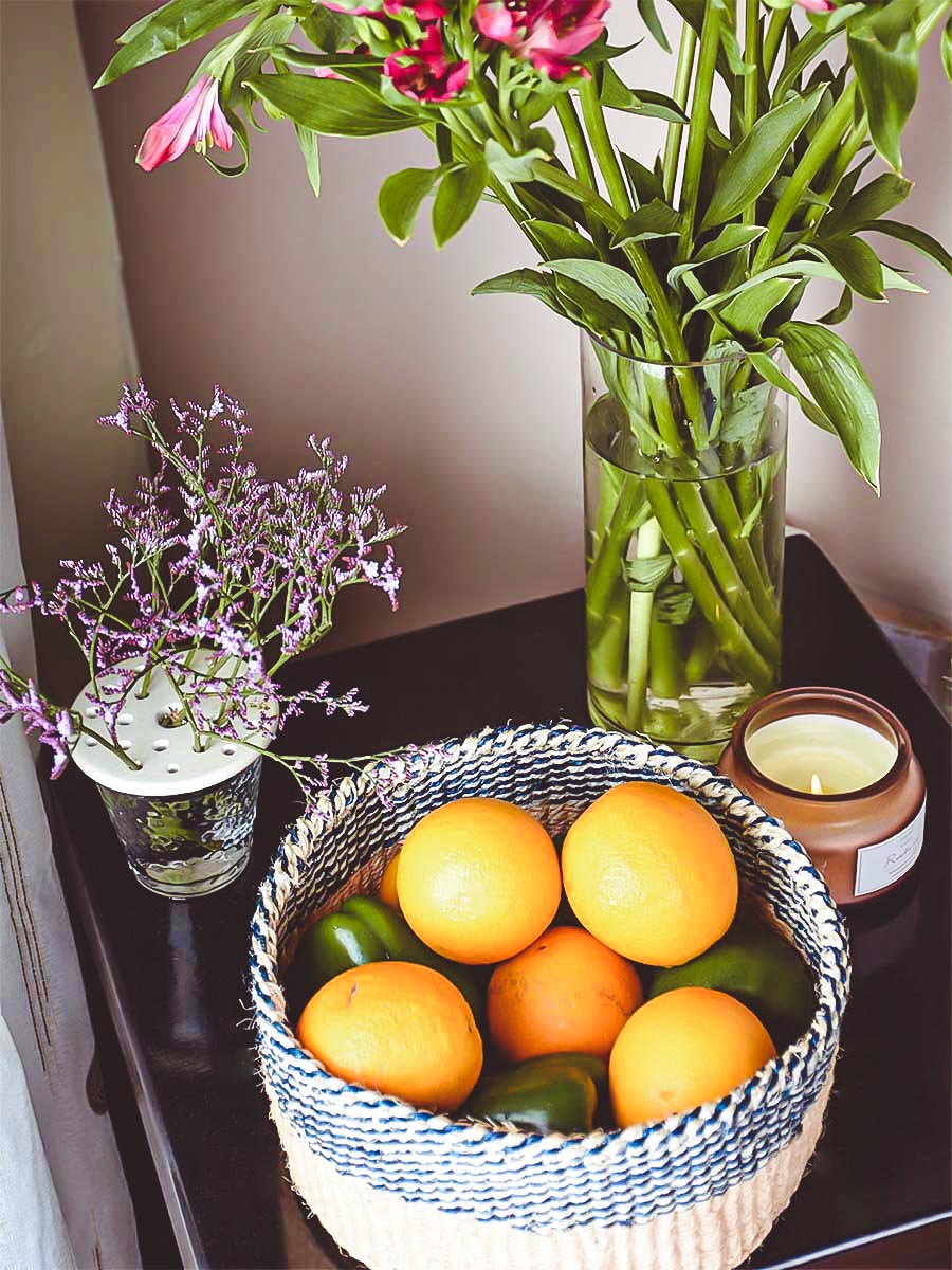 Countertop catchall sisal basket full of fruits on a table