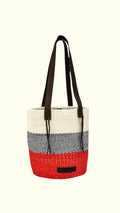 Woven tote bag with red bottom half, black handle, and gray top half on a white background