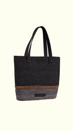 Black and brown woven tote bag on a white background